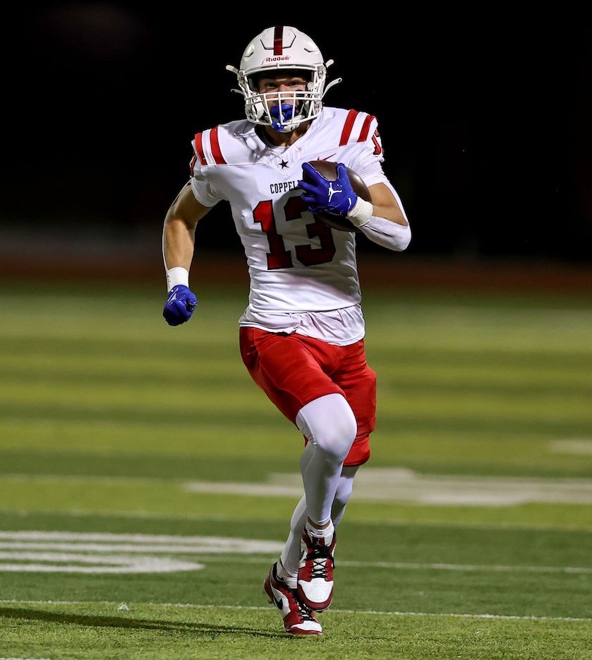 Coppell wide receiver Harry Hassmann (13) gets three touchdown receptions against Lewisville...