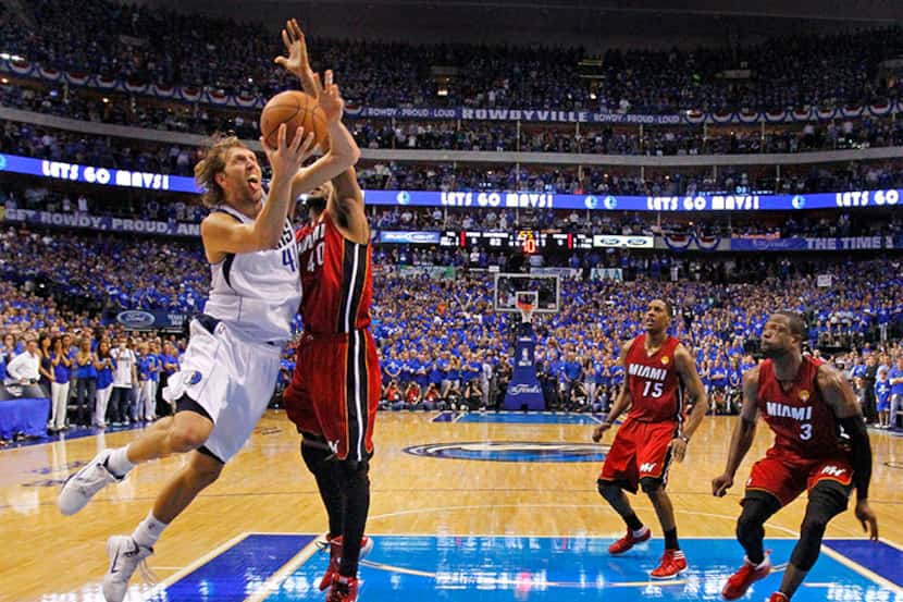  June 7, 2011--Dallas Mavericks Dirk Nowitzki (41) hits the big shot of the game to keep the...