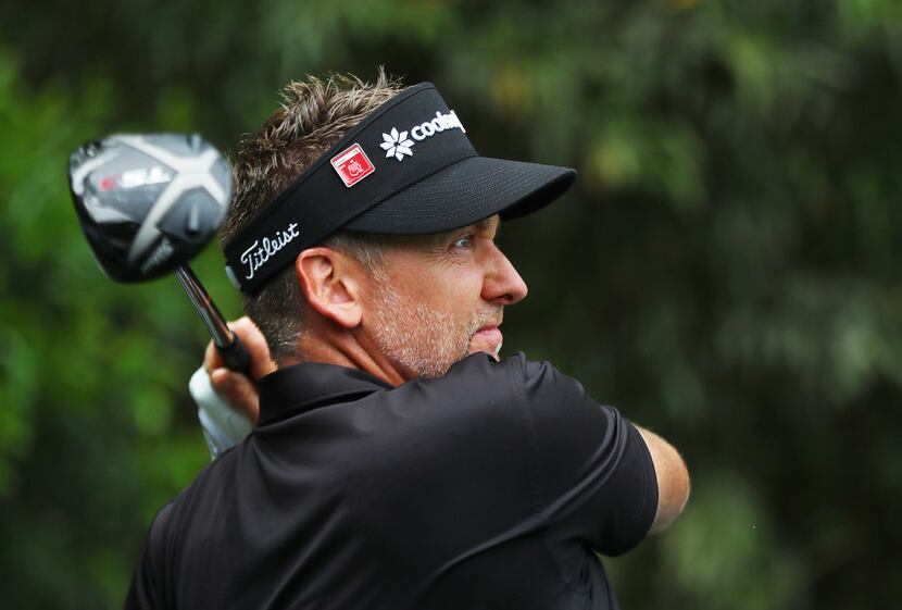 Ian Poulter hits from the 14th tee during the second round of the Masters Tournament on...