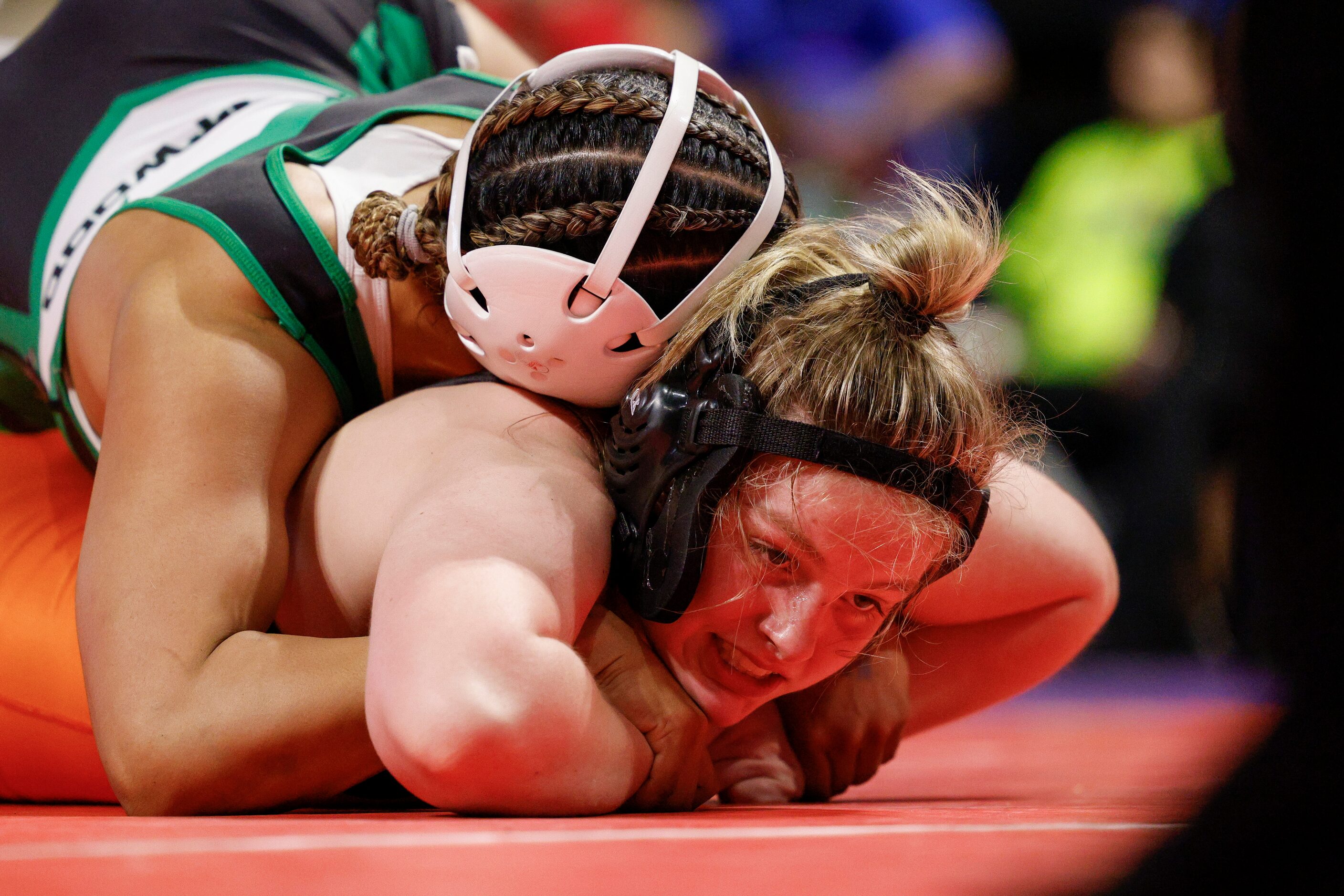 Aremie Steele of El Paso Montwood (left) wrestles Marqelle Fisher of Rockwall during a...