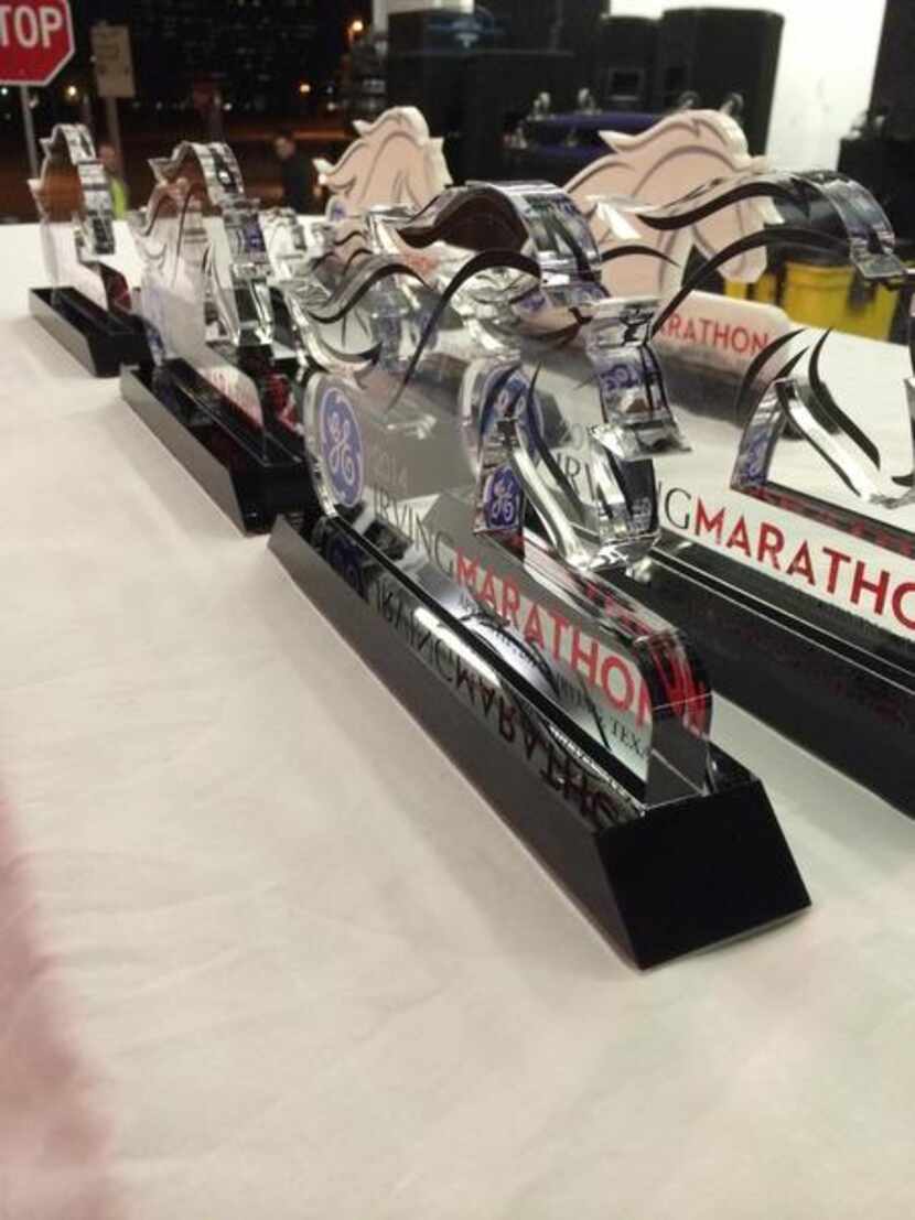 
Winners received these trophies in the Irving Marathon. 

