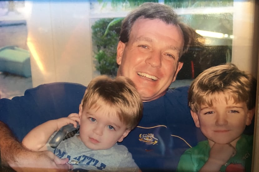 Texas A&M head football coach Jimbo Fisher with his sons Trey and Ethan. This is a photo in...