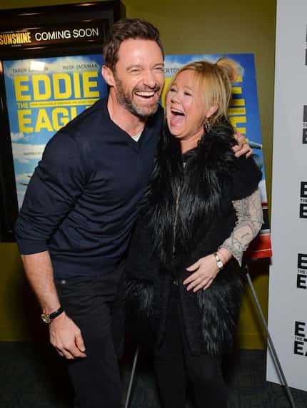 Actor Hugh Jackman, left, shares a laugh with actress Caroline Rhea at a special screening...