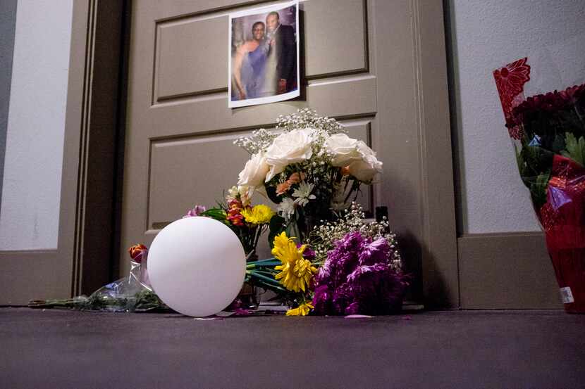 Flowers were placed at the front door apartment of Botham Jean on Sept. 10, 2018 in Dallas....