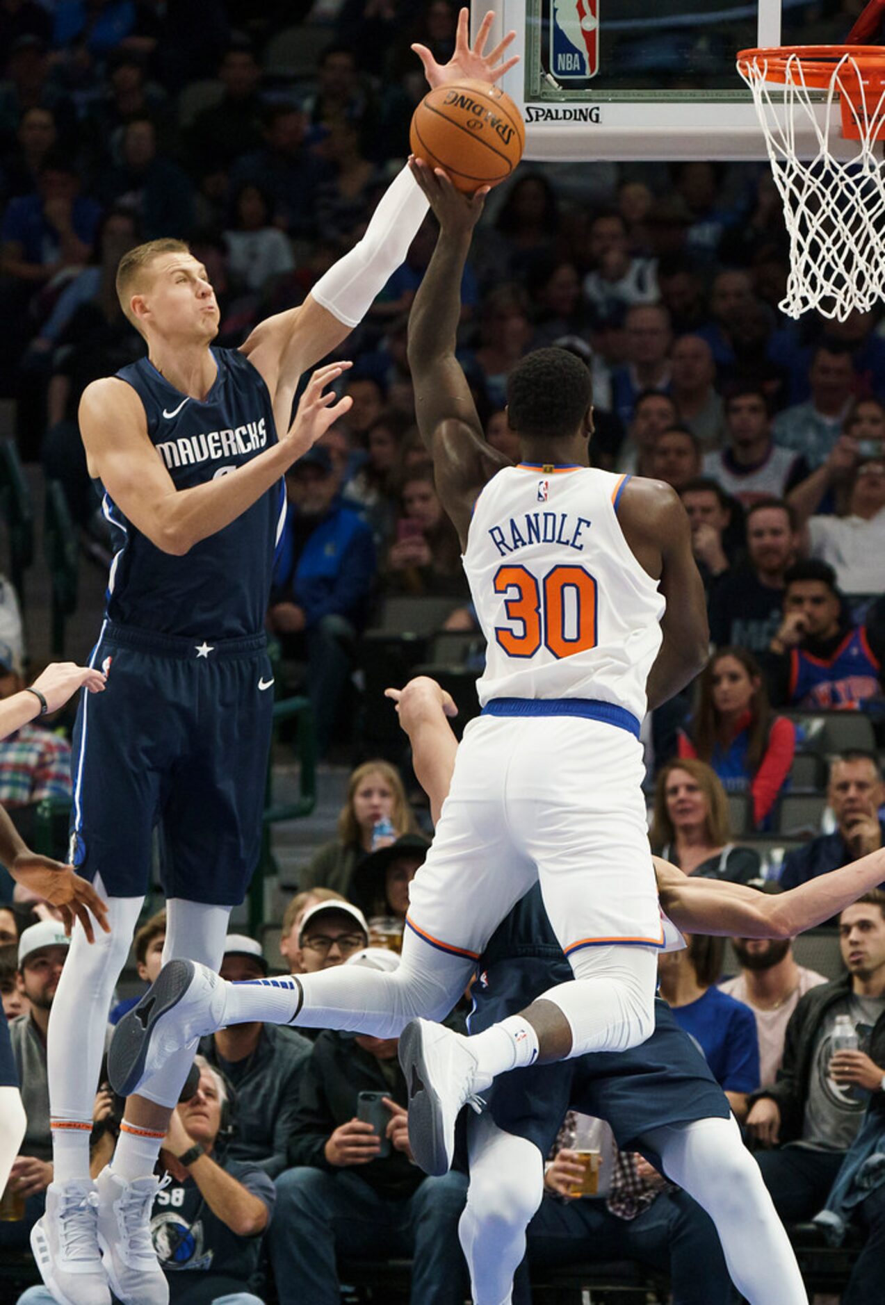 Dallas Mavericks forward Kristaps Porzingis (6) blocks a shot by New York Knicks forward...