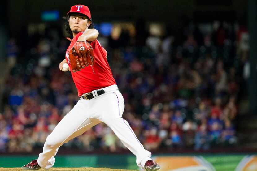 Texas Rangers starting pitcher Yu Darvish pitches during the fifth inning against the Tampa...