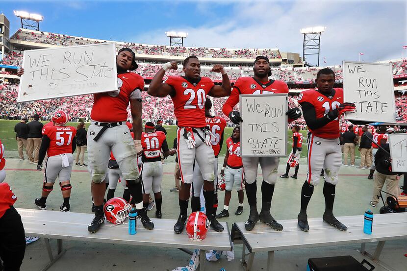 Georgia 0layers, from left, Jonathan Ledbetter, J.R. Reed, D'Andre Walker, and Deandre Baker...