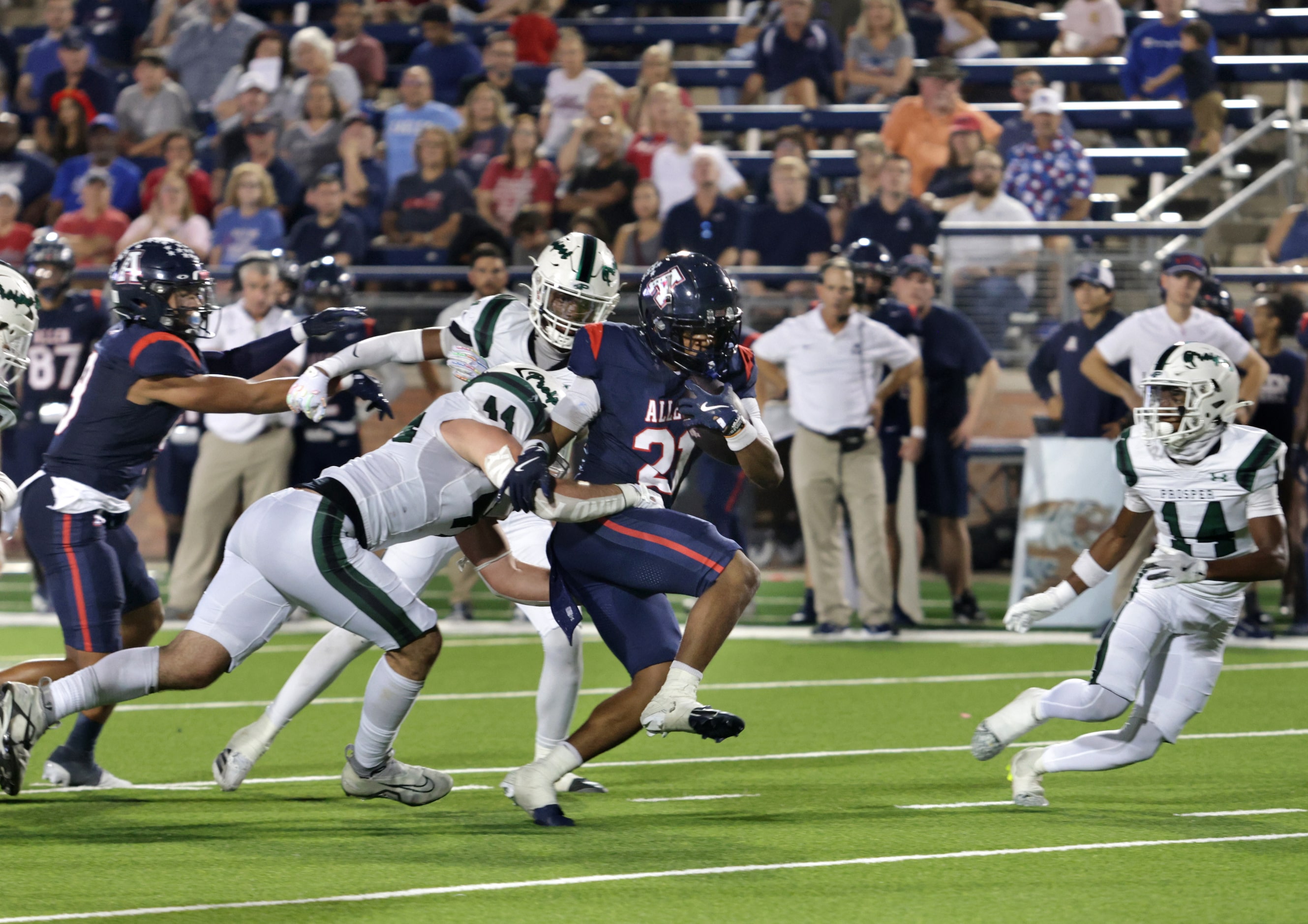 Allen player #21 Jaden Hambric runs the ball during the Prosper High School at Allen High...