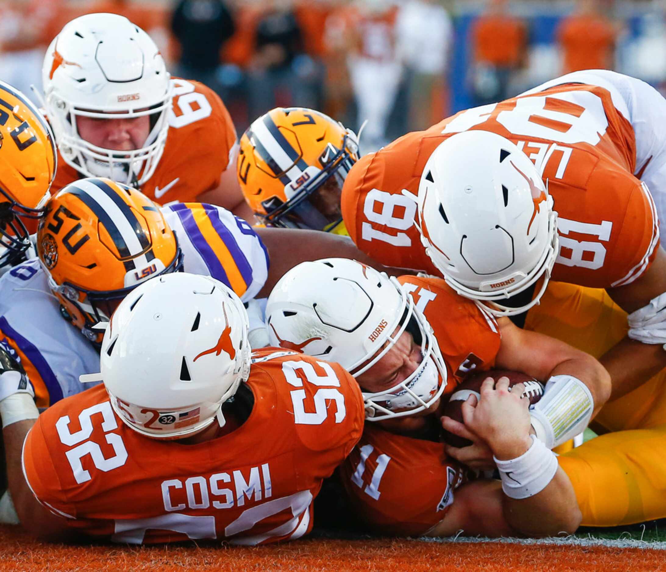 Texas Longhorns quarterback Sam Ehlinger (11) fails to score as he is brought down by LSU...
