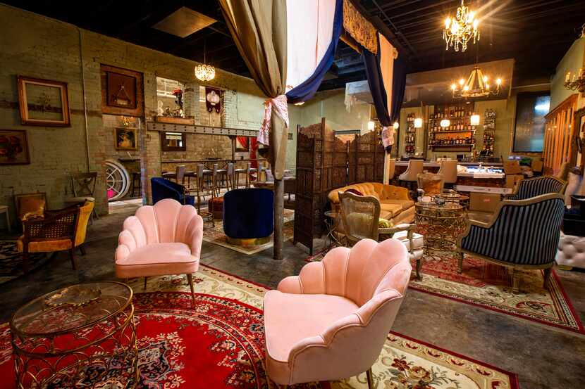 The Amber Room, a Gatsby-style speakeasy, is attached to a new restaurant named Wishbone &...