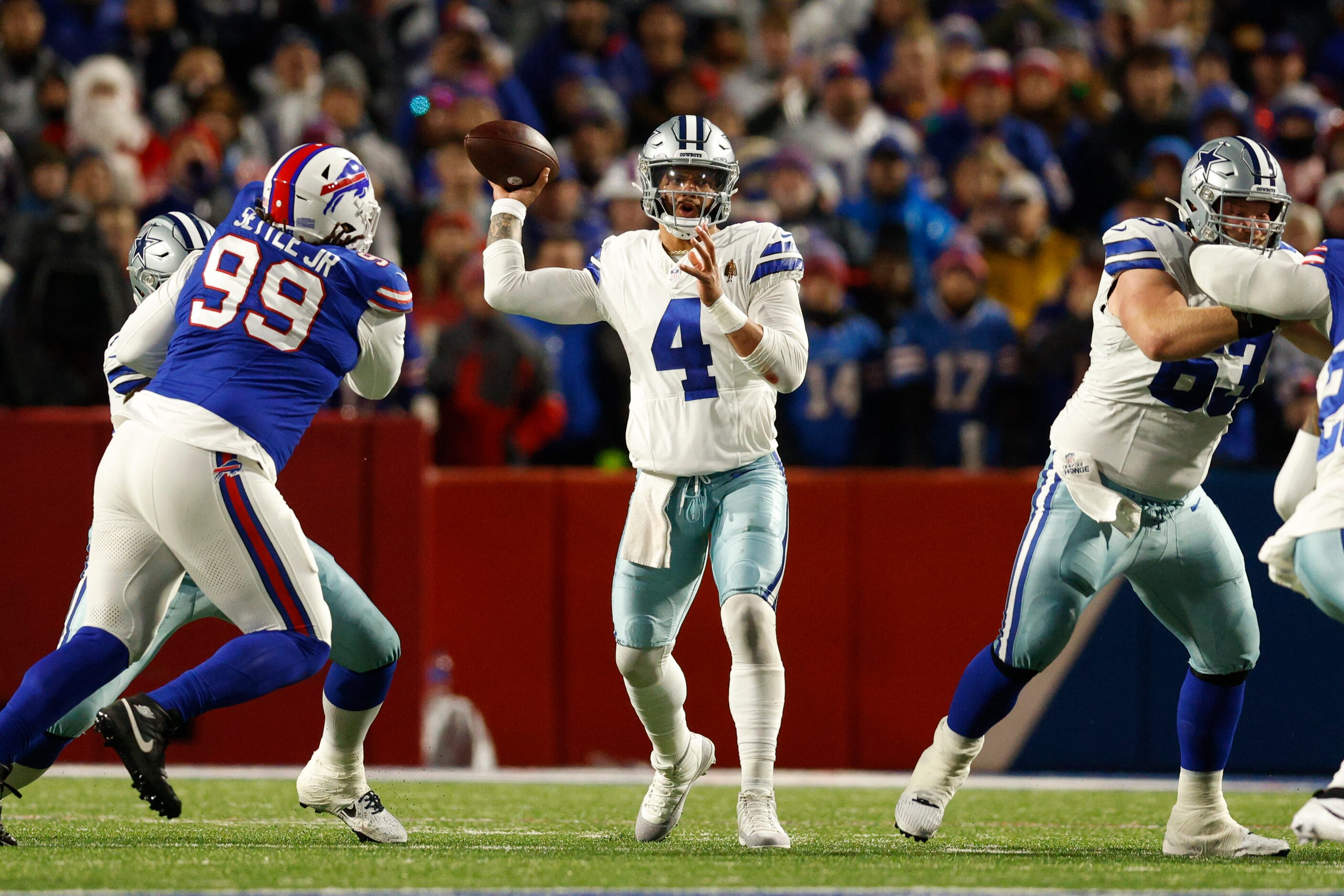 Dallas Cowboys quarterback Dak Prescott (4) throws a pass during the first half of an NFL...