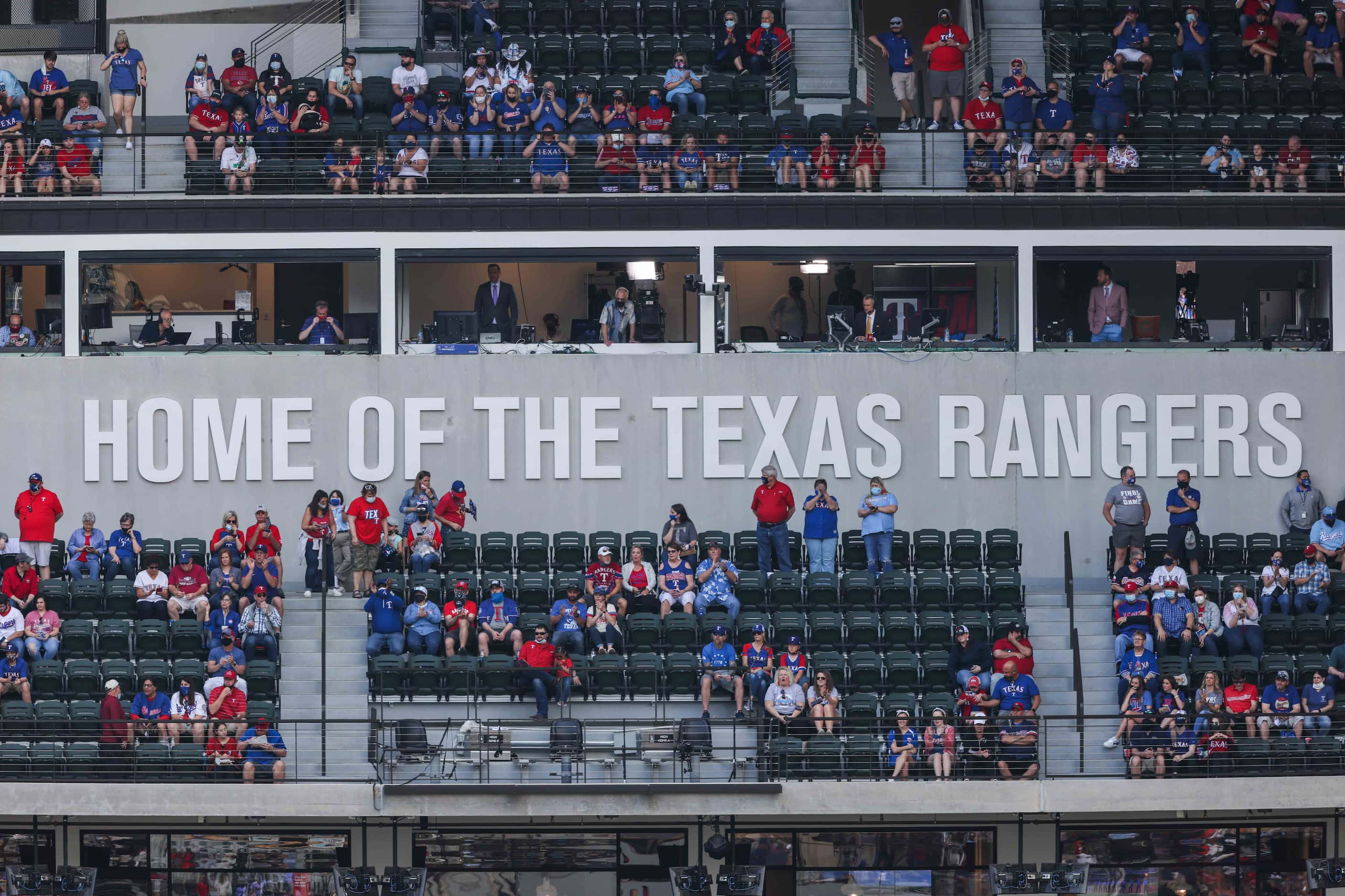 Fans start to arrive at the Globe Life Field to attend the game between Texas Rangers and...