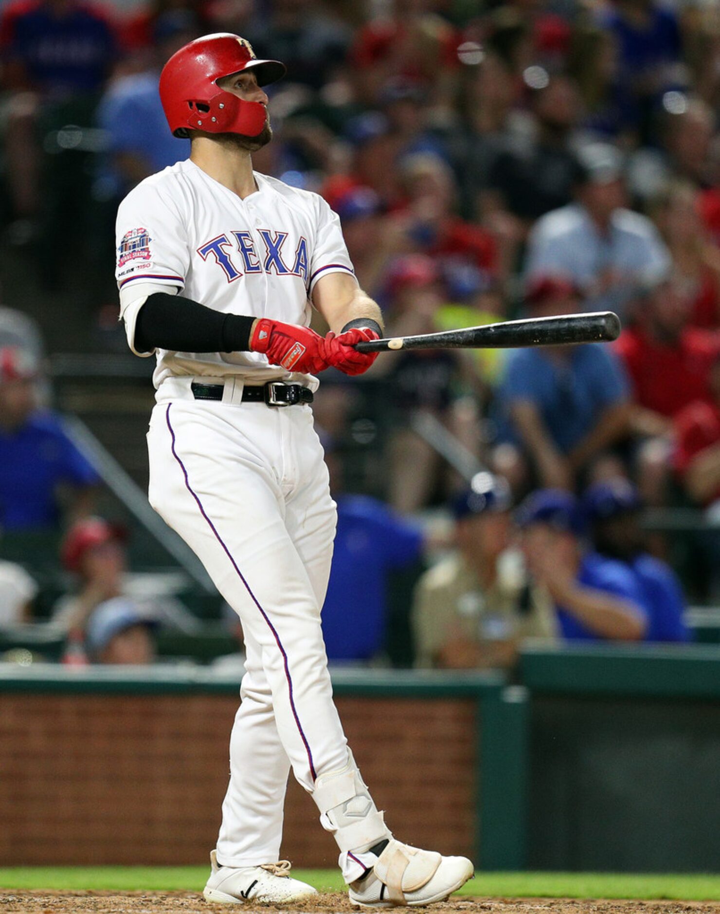 ARLINGTON, TEXAS - MAY 31: Joey Gallo #13 of the Texas Rangers watches his grand slam home...