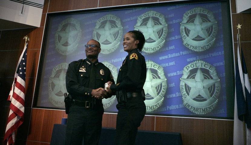 Then-Police Chief David Brown presented a deputy chief badge to Catrina Shead in July 2012.