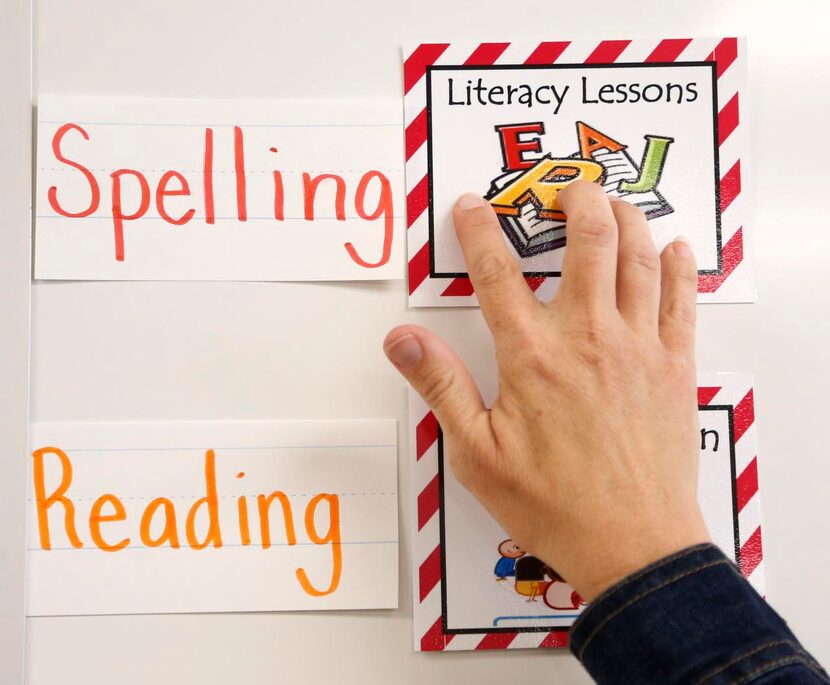 
Kindergarten teacher Bethany Harris works on a board in her room at Norris Elementary. 


