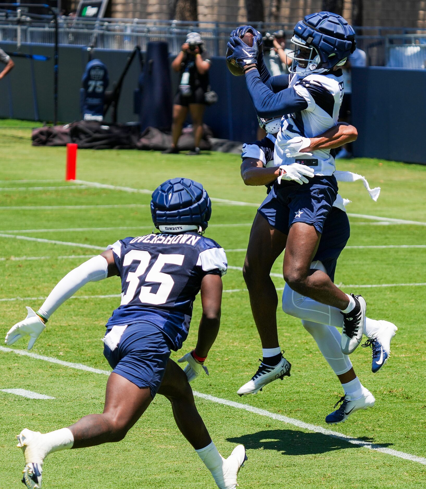 Dallas Cowboys wide receiver John Stephens Jr. (49) catches a touchdown pass as Dallas...