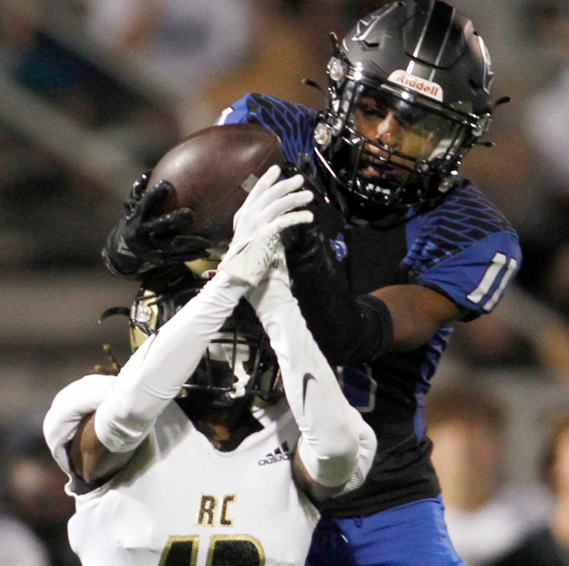 North Forney receiver Jaquarion Robinson (11) pulls in a 51-yard touchdown reception off the...