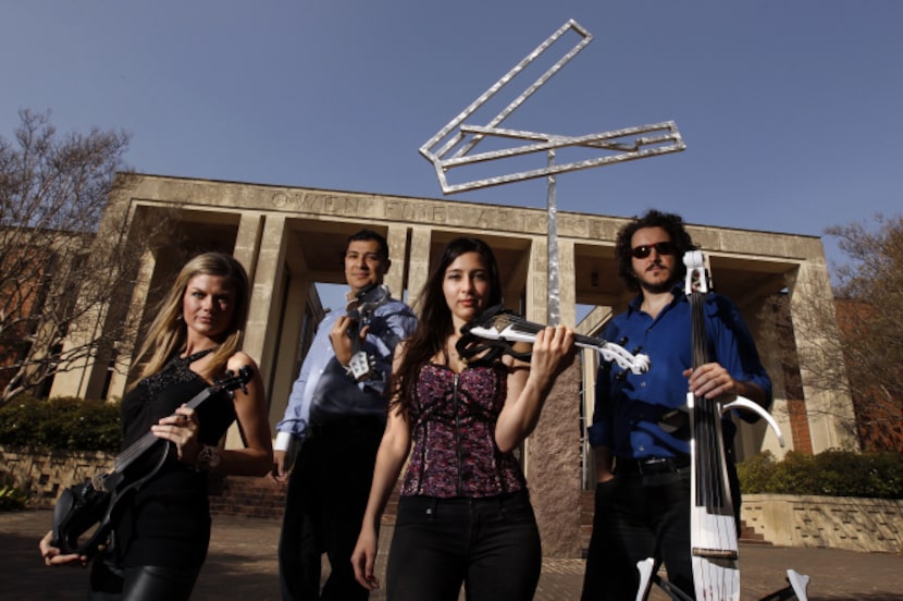 Ion Zanca (second from left), an undergraduate and graduate alumnus of the Meadows School,...