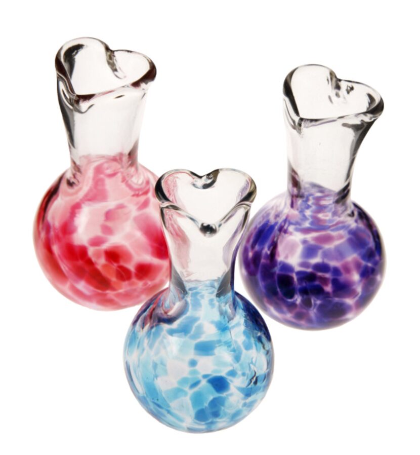 Fresh picked: Blown-glass bud vases in spring colors hold Mom’s favorite flowers. $22 at...