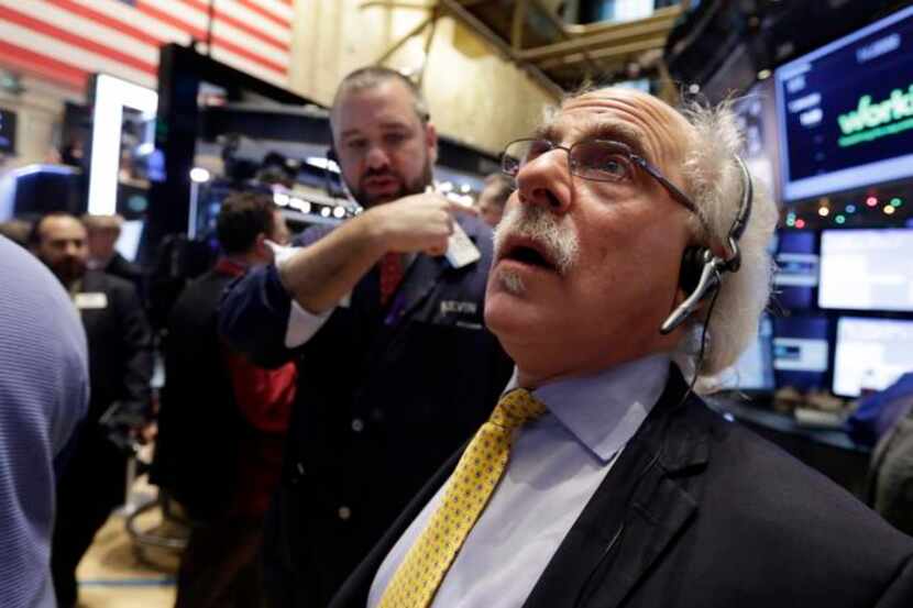 
Traders Peter Tuchman (right) and Kevin Lodewick watched the carnage Friday at the New York...