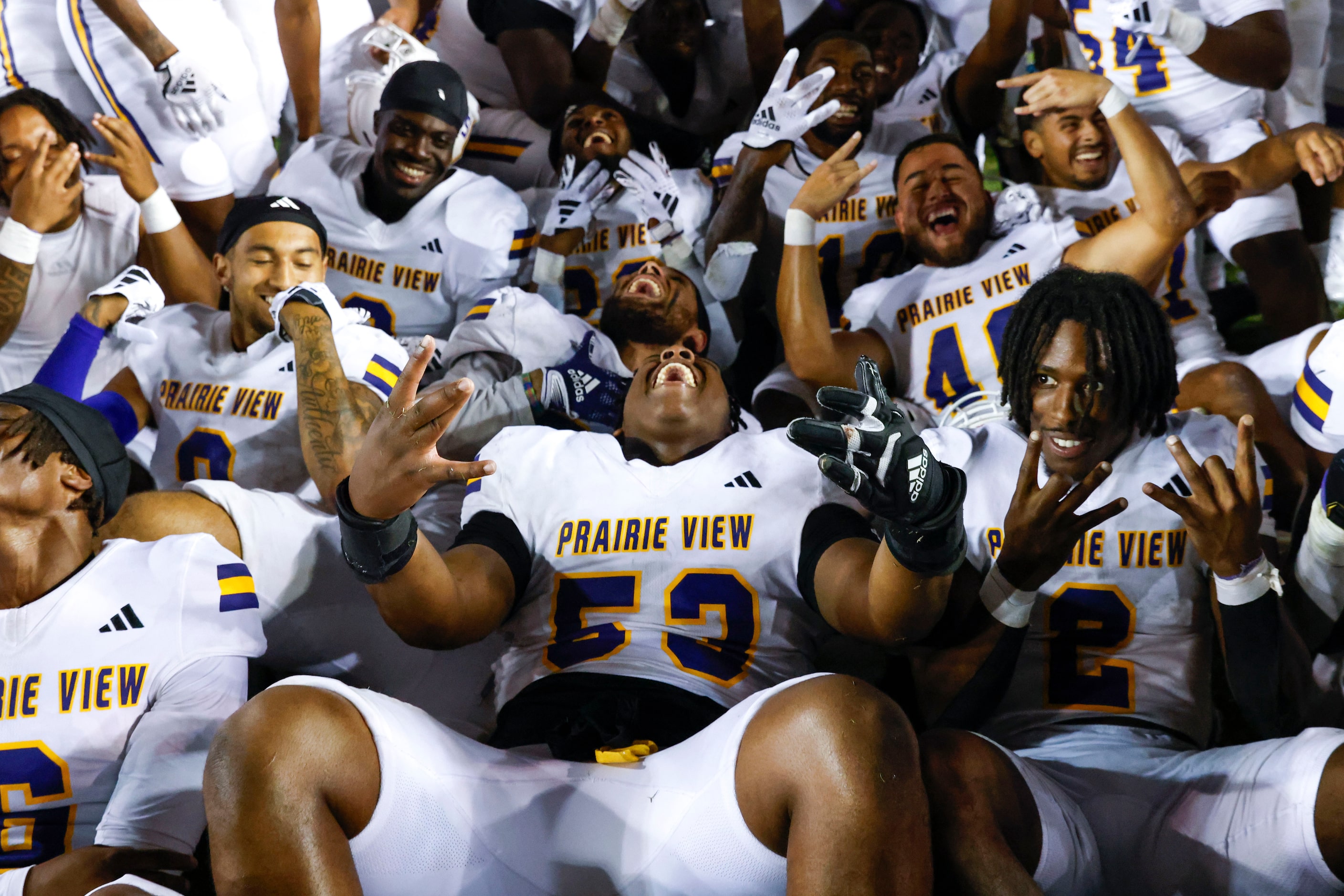 Prairie View A&M players celebrate after winning the State Fair Classic against Grambling...