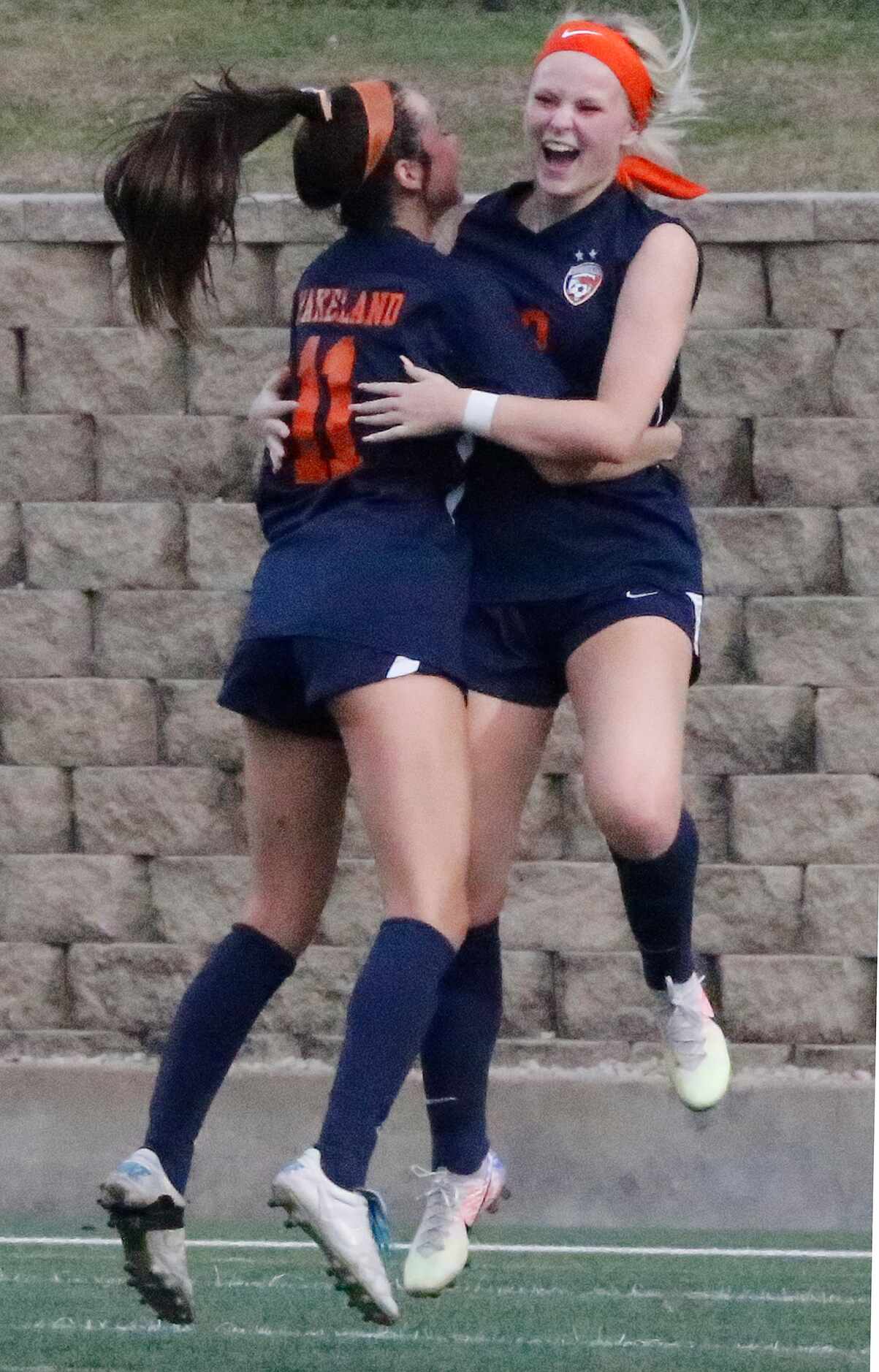 Wakeland midfielder McKenna Jenkins (22) leaps in the air to celebrate her goal with team...