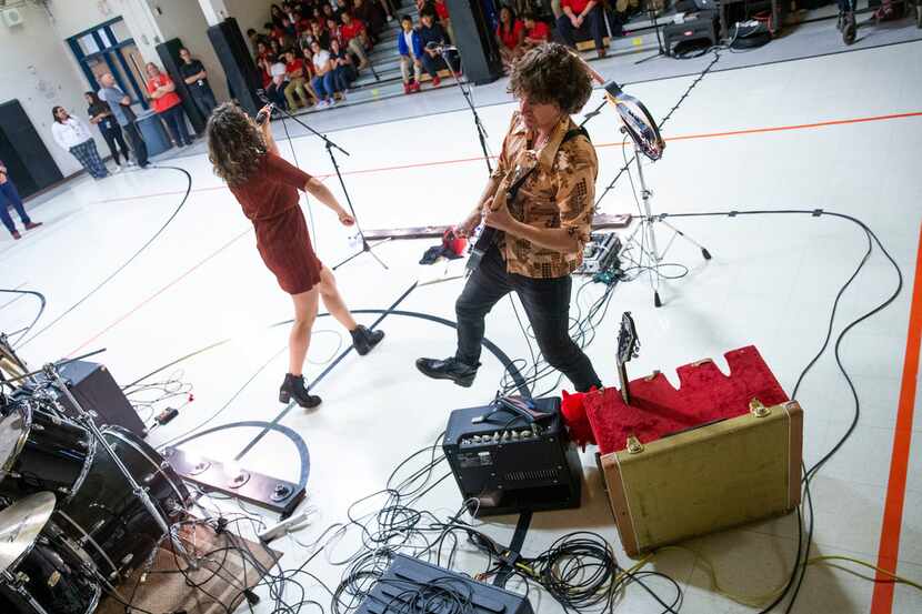 Erin O'Neill and Steve Gooding of the band Gooding perform at Bussey Middle School in...