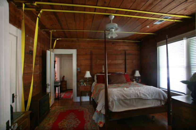 ROOM AND BOARDS: Worley and Swenson’s in-renovation bedroom, below, sans plaster but...
