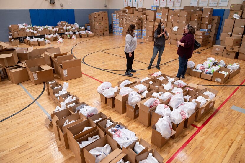 Irene Johnson (left) district executive director for Frisco Family YMCA and Plano Family...