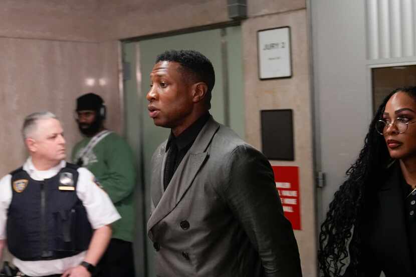 Jonathan Majors leaves a courtroom at the Manhattan criminal courts in New York, Monday,...