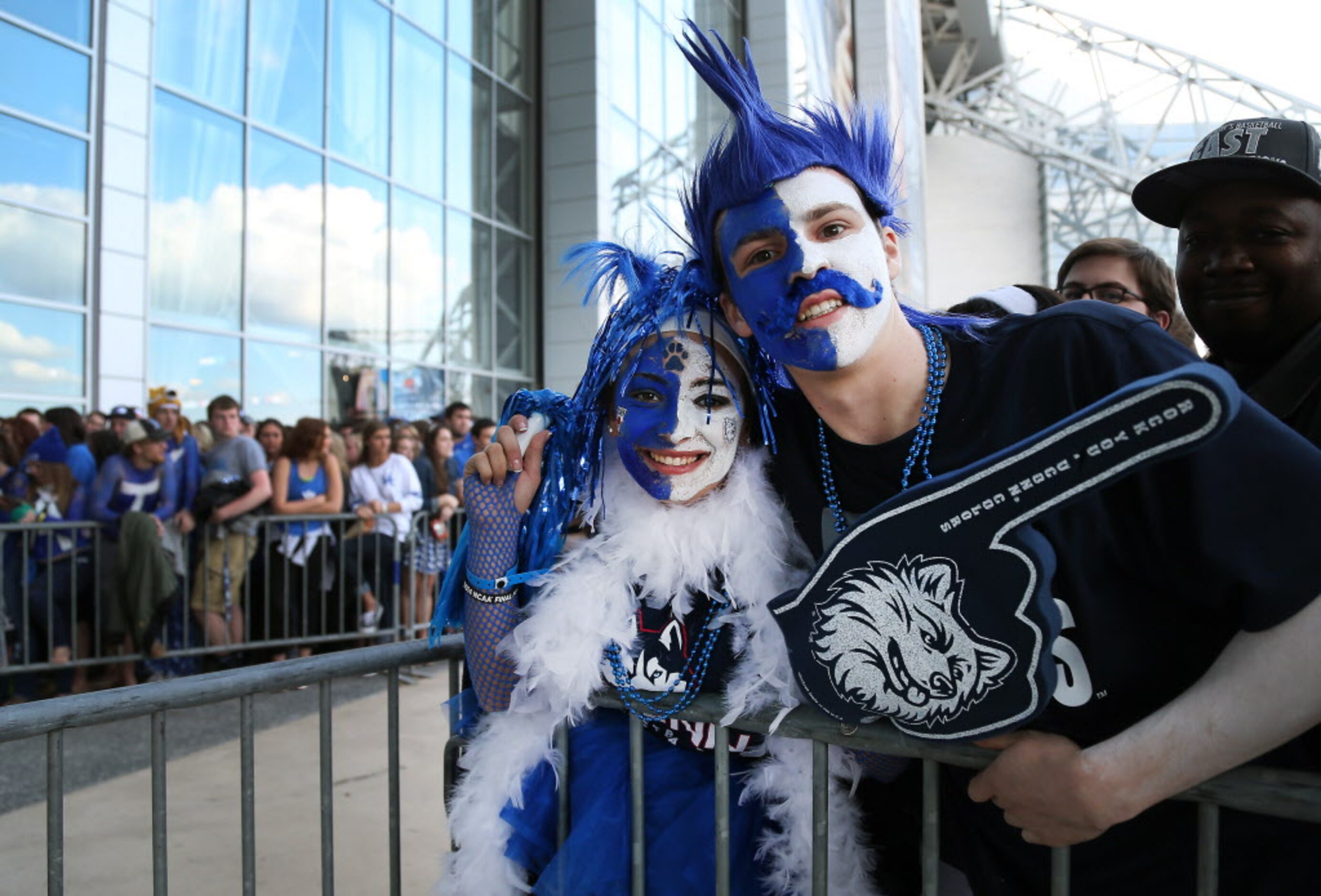 Connecticut  fans Danielle Wagmeister and CJ Baumann wait to be the first inside the stadium...