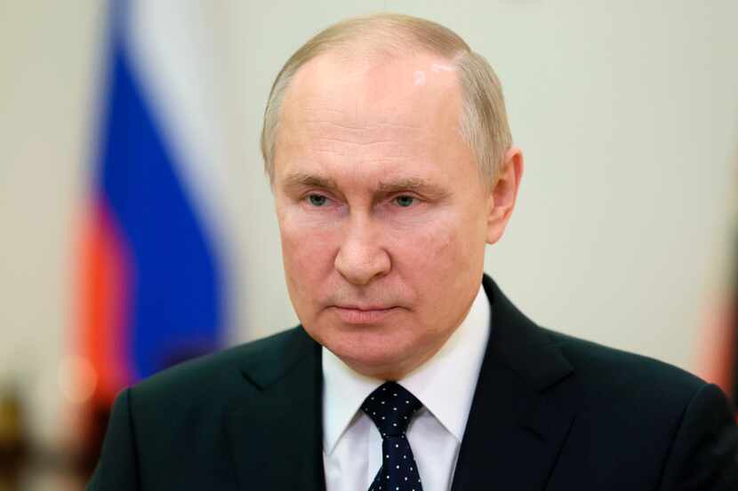 Russian President Vladimir Putin speaks during a video address on the Day of Security Agency...