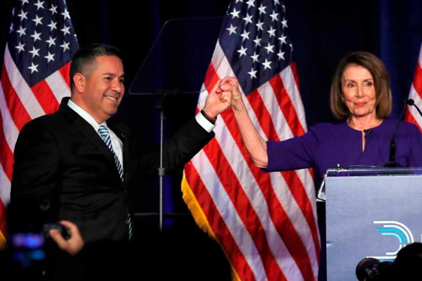 Nancy Pelosi y el funcionario demócrata  Ben Ray Luján celebran victorias de su partido, la...