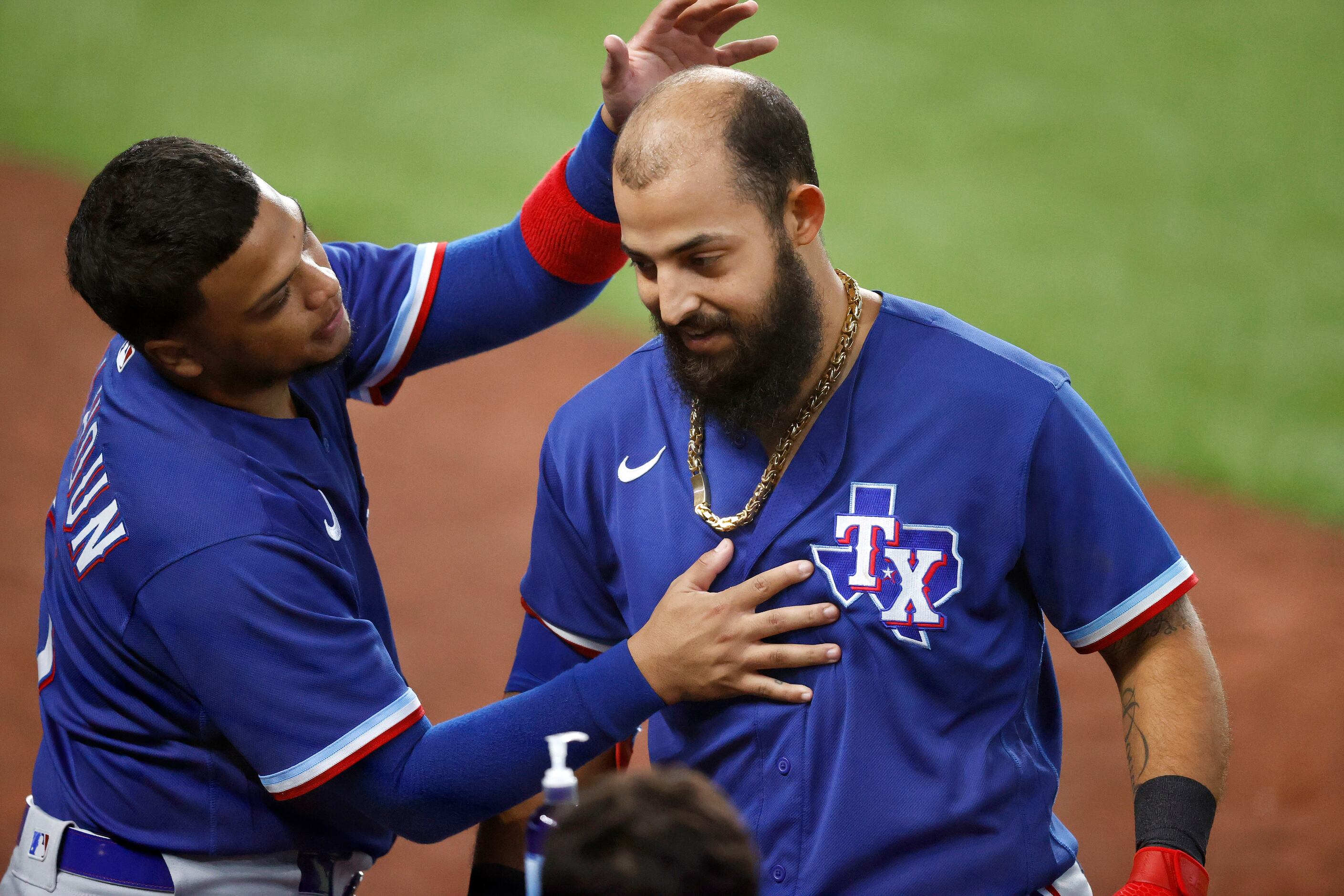 Texas Rangers Rougned Odor (right) is congratulated on his home run by teammate Willie...