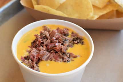 Chips and queso at Brisket Love BBQ in Plano can come topped with brisket for $2 extra. You...