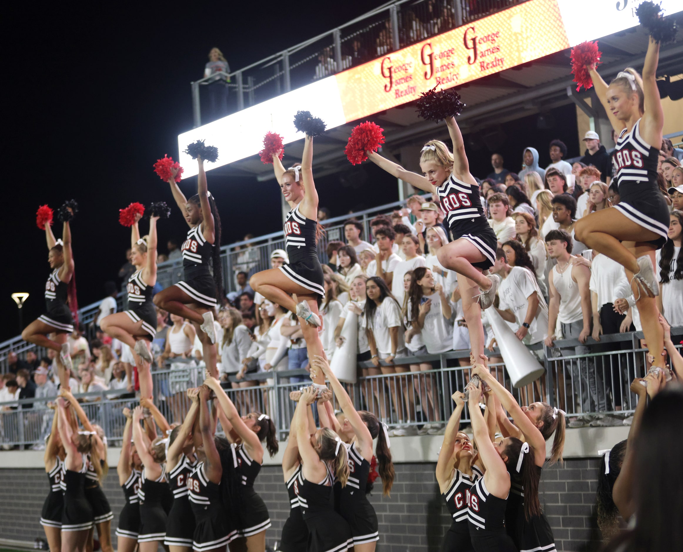 The Melissa cheerleaders celebrate a touchdown during the Prosper Walnut Grove High School...