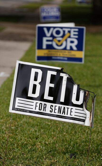 Beto O'Rourke and Colin Allred signs were burned Tuesday night in Richardson.