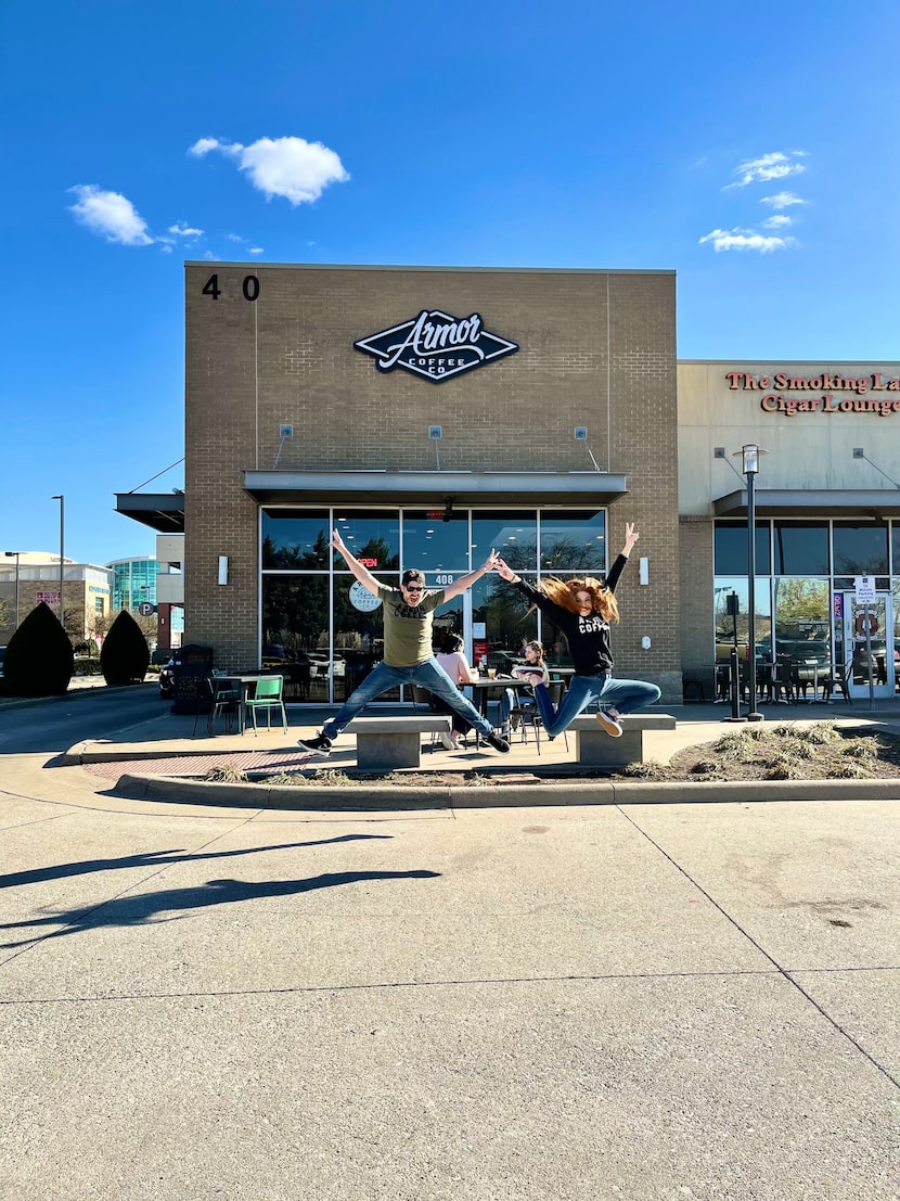 Mike and Jenn Todryk in front of their Armor Coffee Co. cafe in The Village at Allen.