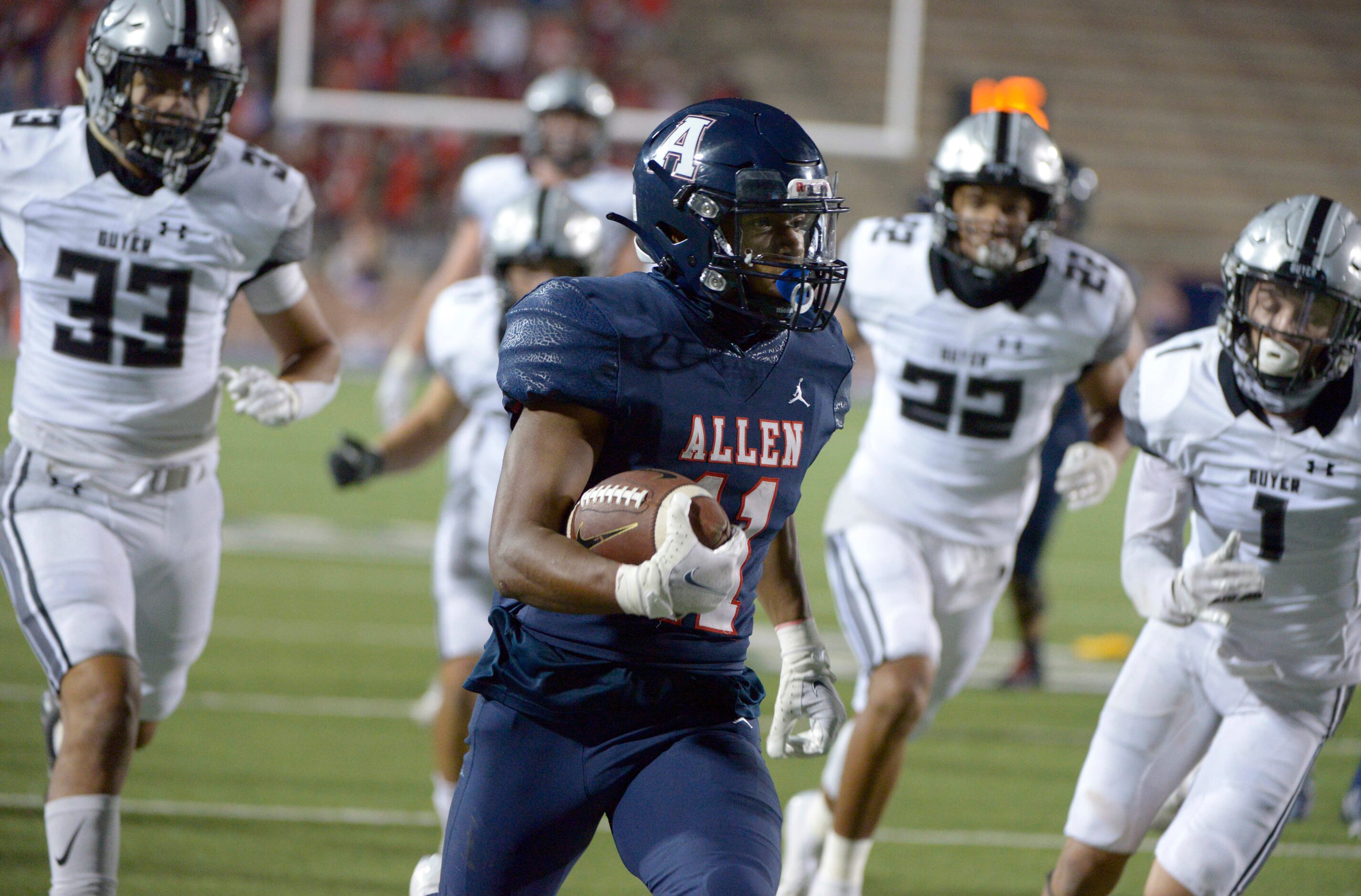 Allen’s Jordan Johnston (11) runs upfield in the third quarter of a high school football...