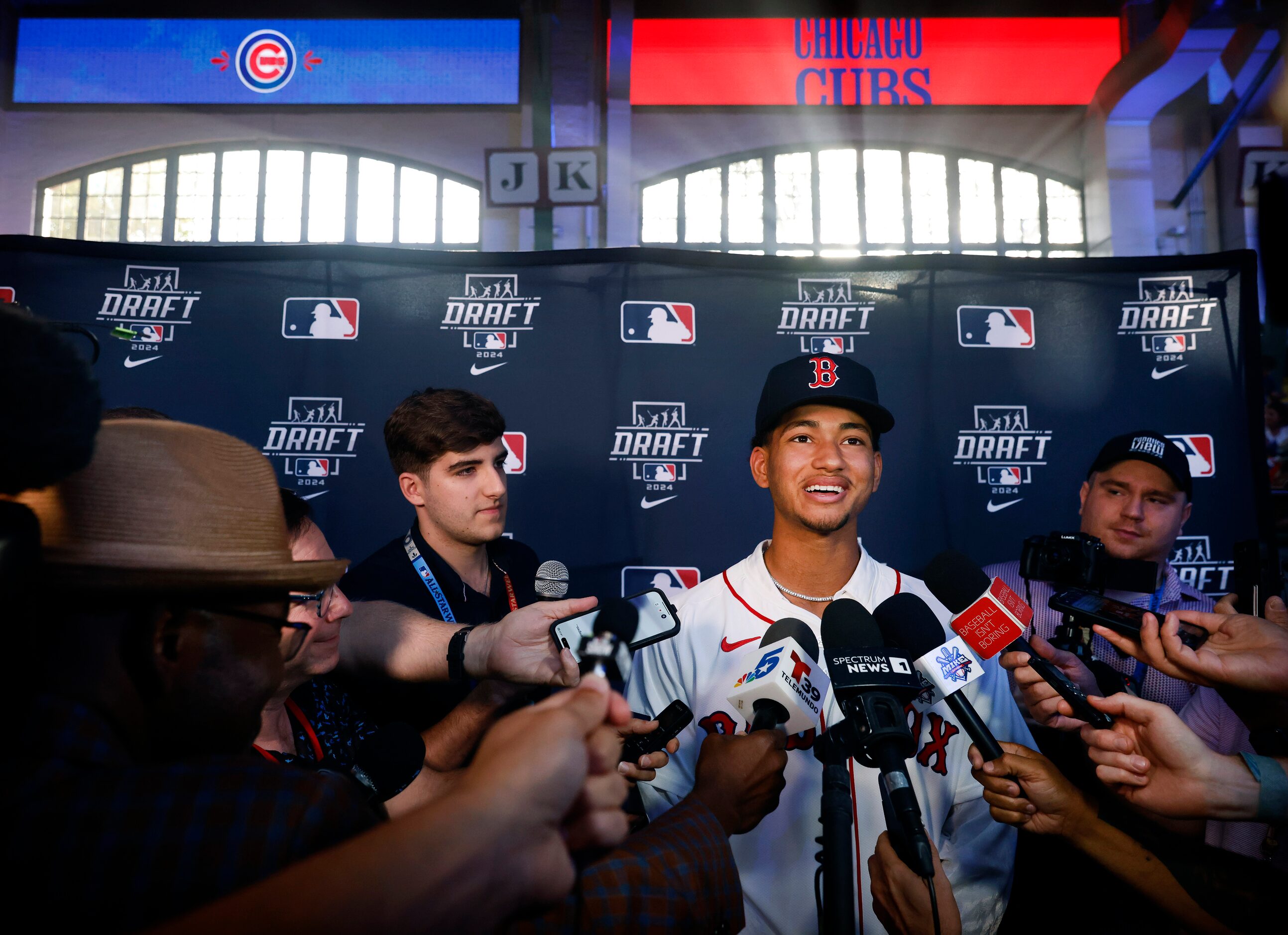 Braden Montgomery, a right fielder from Texas A&M, is interviewed by the media after being...