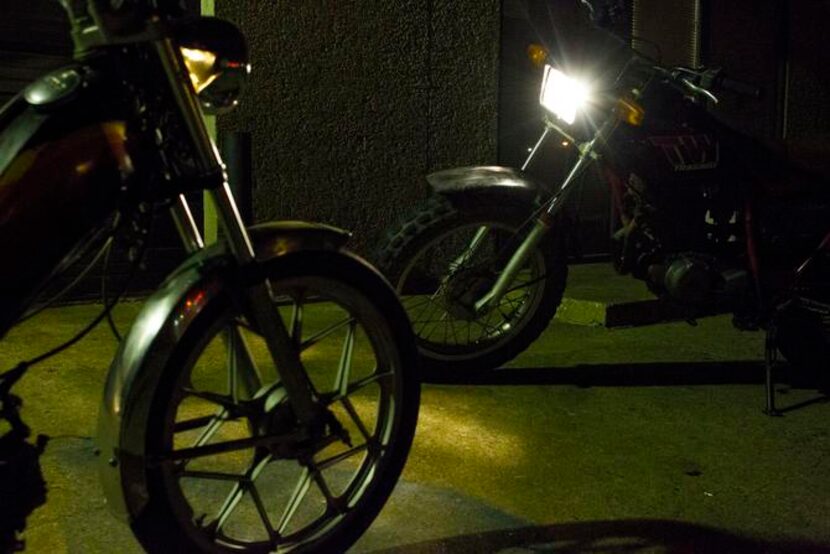 
Two mopeds sit outside of Kyle's Scooter Shop in Dallas, Texas, after a weekly Pine Box...