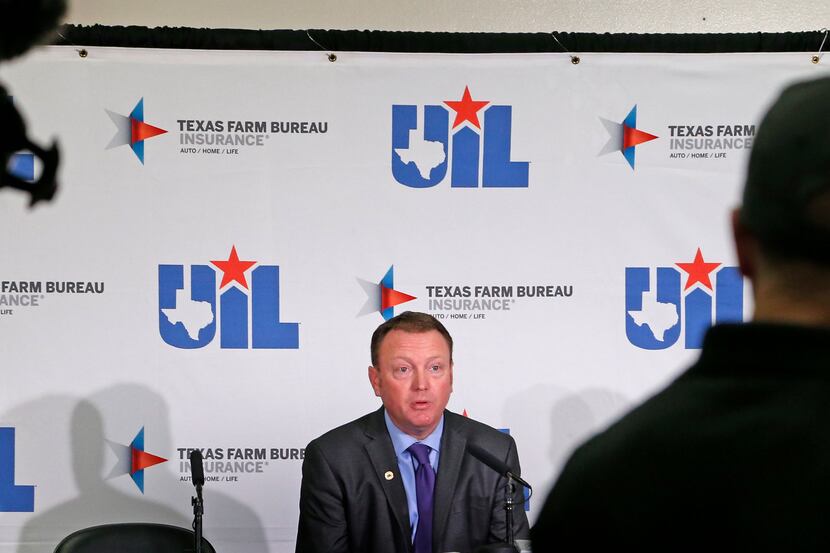 UIL deputy executive director Jamey Harrison addresses the media after the UIL boys...