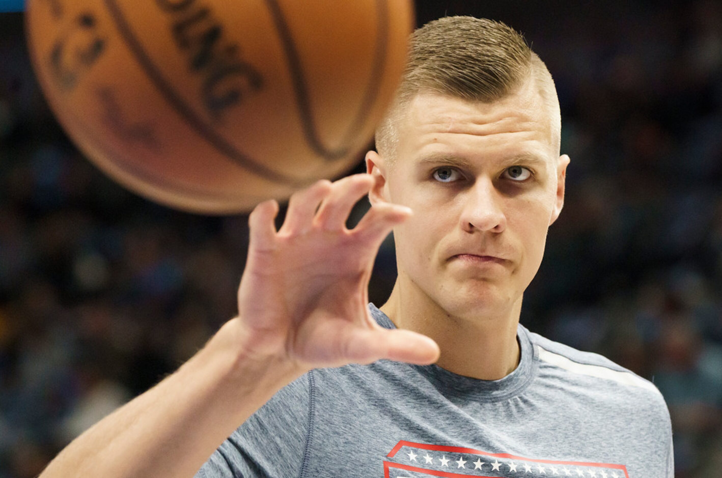 Dallas Mavericks forward Kristaps Porzingis warms up before an NBA basketball game against...