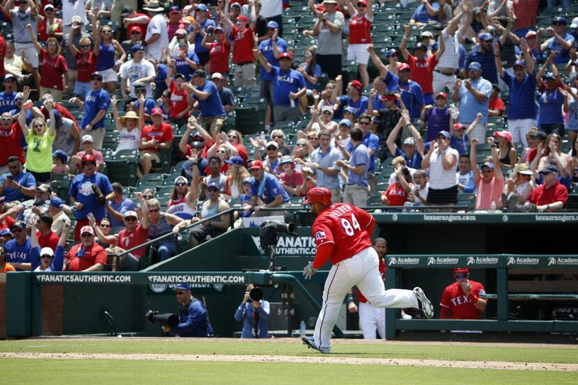 Texas Rangers designated hitter Prince Fielder (84) runs the bases after a home run against...