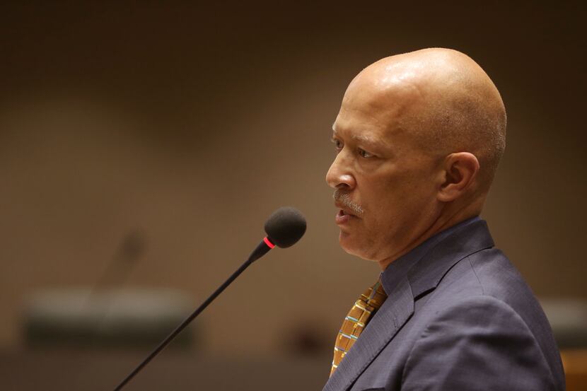 Dallas County District Attorney John Creuzot speaks to City Council members about his police...