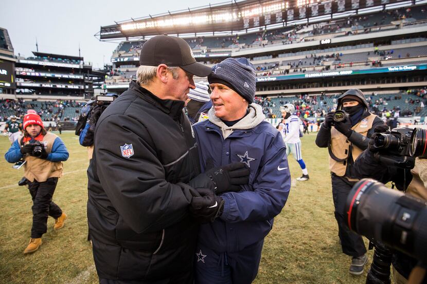 FILE - Cowboys head coach Jason Garrett greets Philadelphia Eagles head coach Doug Pederson...