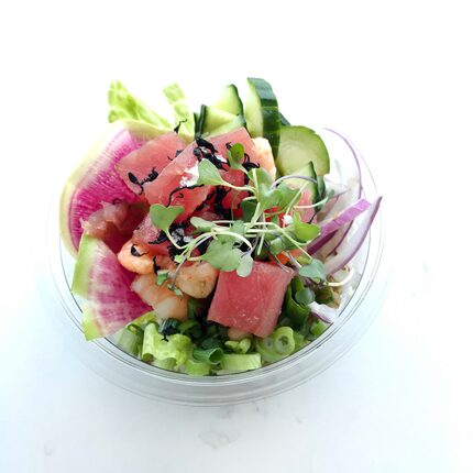 Freshfin Poke Co.'s signature Hawaiian OG poke bowl with one tweak: half ahi tuna and half...