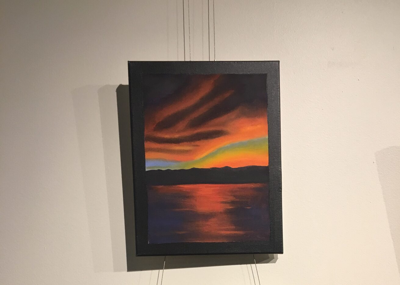 This oil painting of a sunset, done by a girl held in Dallas County juvenile detention who...