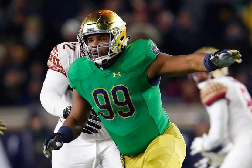 Notre Dame defensive lineman Jerry Tillery (99) plays against Florida State in the first...
