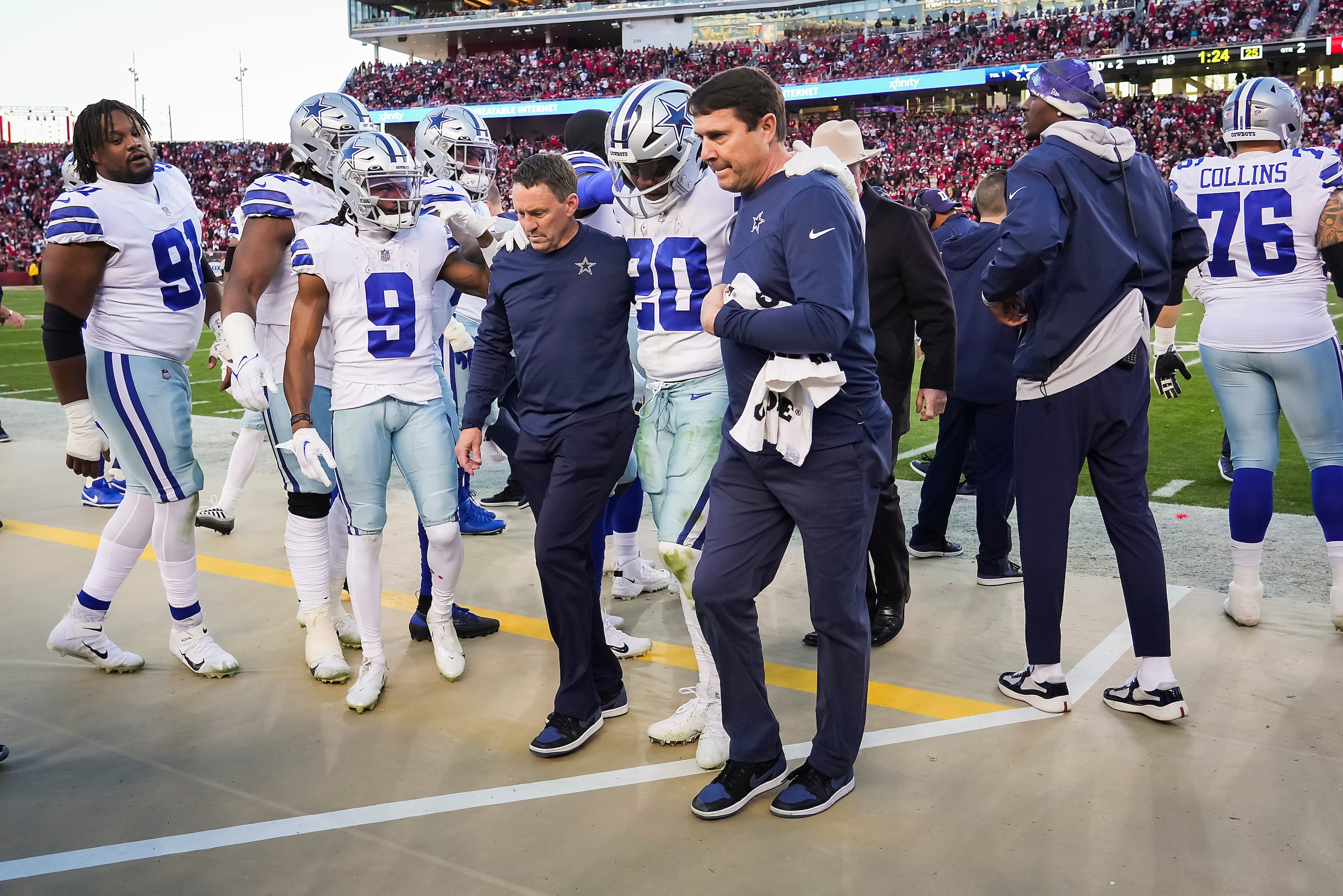 Dallas Cowboys running back Tony Pollard (20)  leaves the field after being injured during...